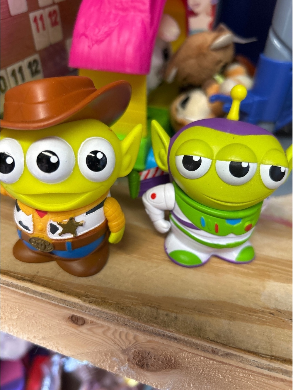 TWO aliens dressed as Woody and Buzz